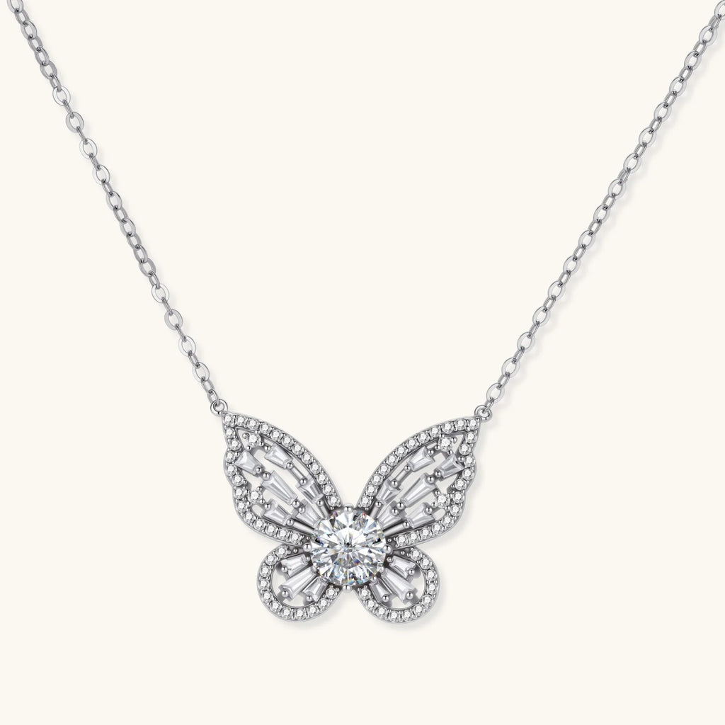 Sterling silver butterfly pendant with radiating design and central moissanite stone on adjustable chain