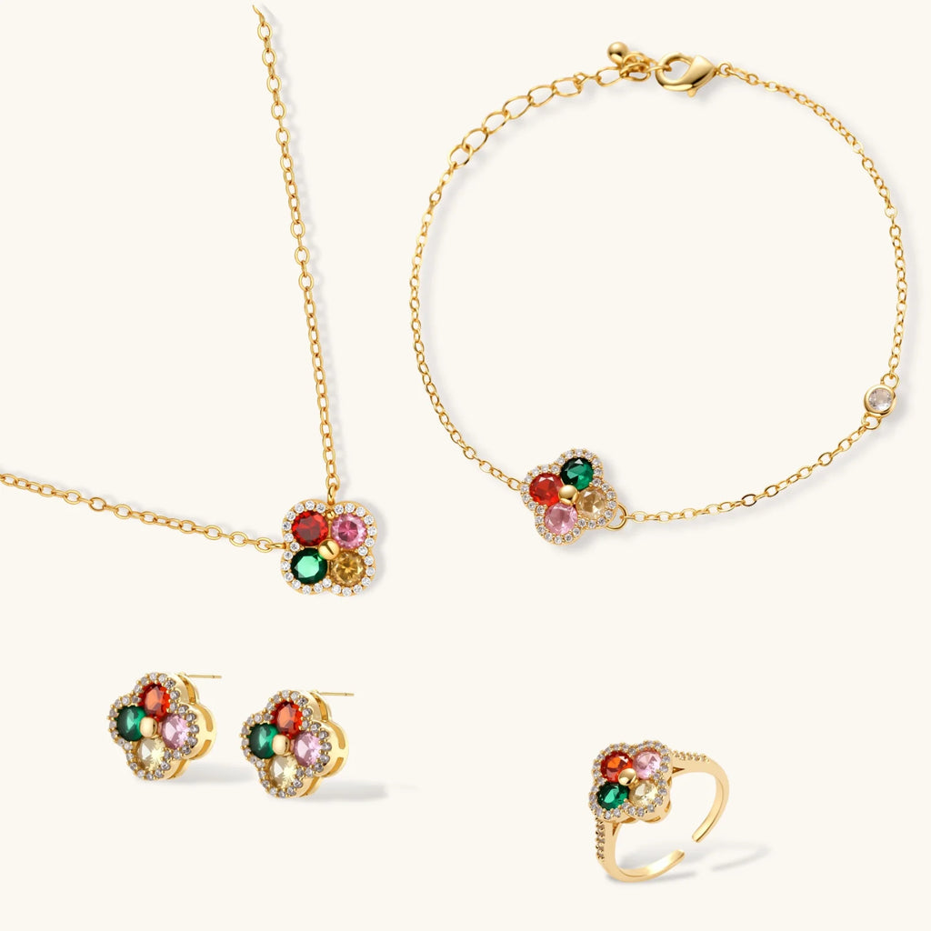 Gold-plated clover jewelry set with red, pink, green and champagne CZ stones surrounded by crystal borders