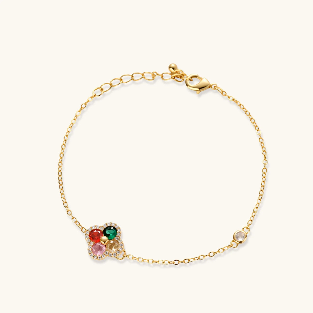 Gold-plated clover jewelry set with red, pink, green and champagne CZ stones surrounded by crystal borders