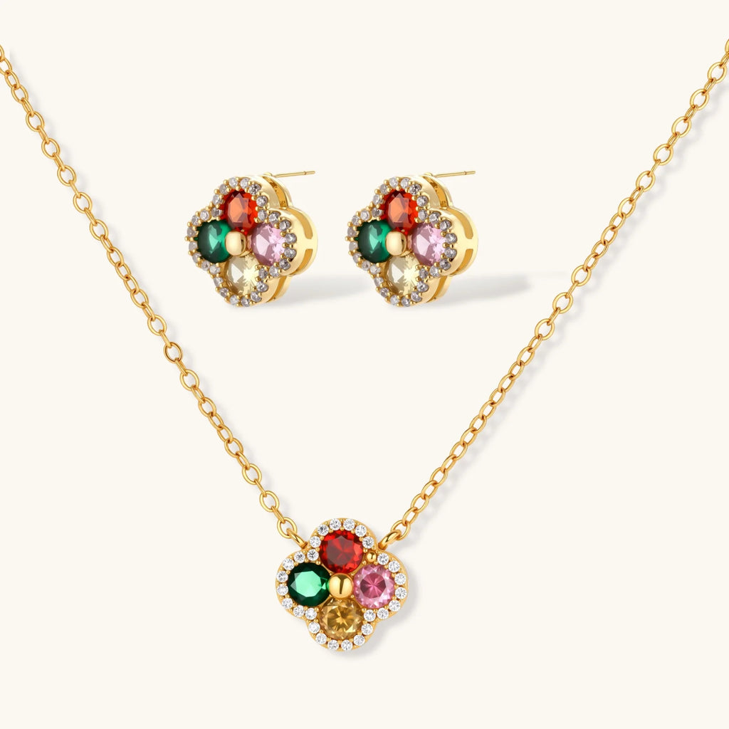 Gold-plated clover jewelry set with red, pink, green and champagne CZ stones surrounded by crystal borders